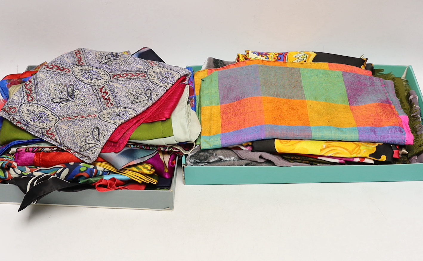 A collection of twenty one mixed silk and velour scarves, including Christian Dior, Pierre Cardin etc.